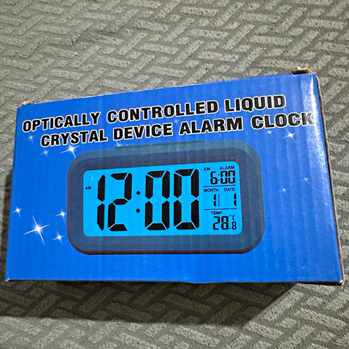 Battery powered digital alarm - battery,