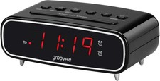 Digital alarm clock with FM